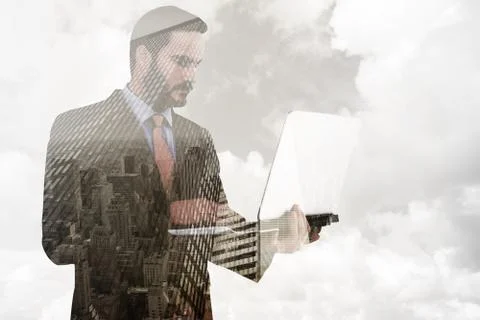 Composite image of focused businessman using his laptop Stock Illustration