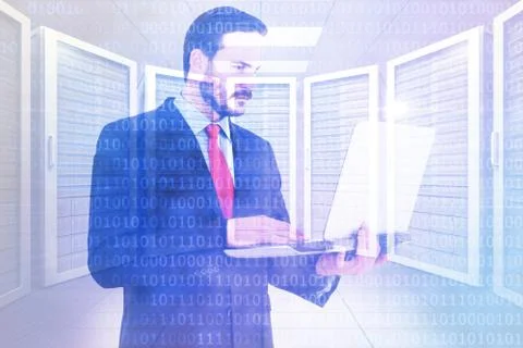 Composite image of focused businessman using his laptop イラスト素材