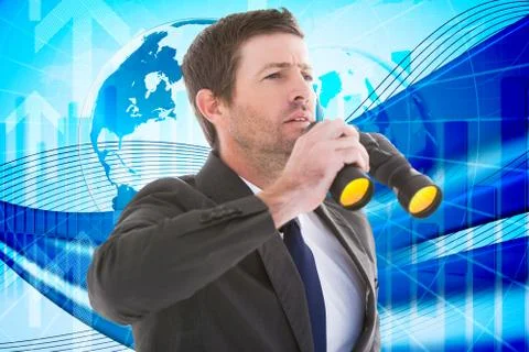 Composite image of focused handsome businessman holding binoculars Illustrazione stock