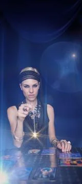 Composite image of fortune teller forecasting the future with pendulum Stock Photos