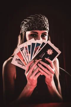 Composite image of fortune teller using tarot cards Stock Photos