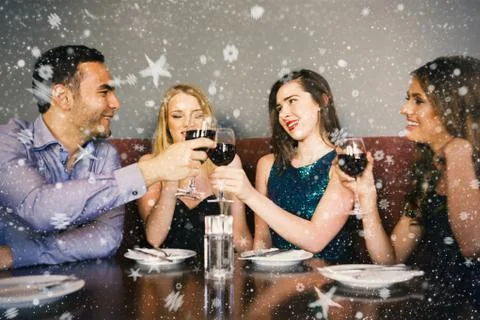 Composite image of friends clinking red wine glasses at a bar Illustrazione stock