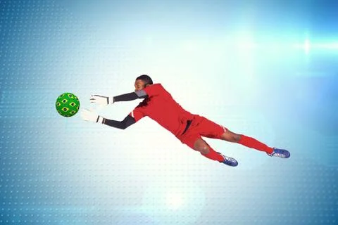 Composite image of goalkeeper in red making a save Illustrazione stock