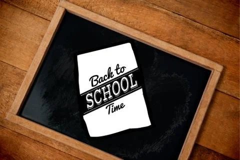 Composite image of graphic image of back to school text on paper Foto stock