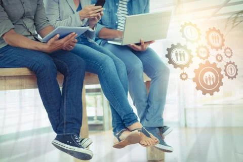 Composite image of graphic image of human representations in gears Stock Photos