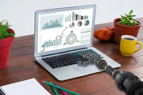 Composite image of gray metal robotic arm Stock Photos