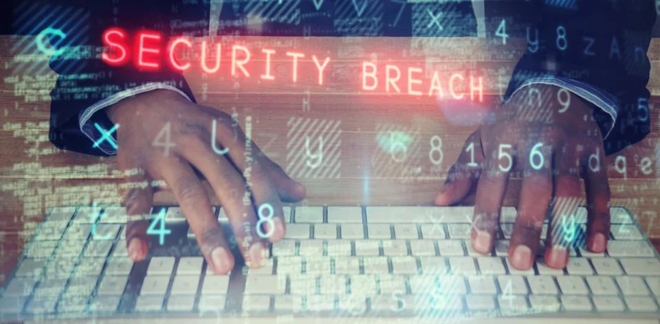 Composite image of hacker using computer keyboard 스톡 사진