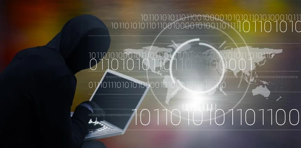 Composite image of hacker using laptop Stock Photos