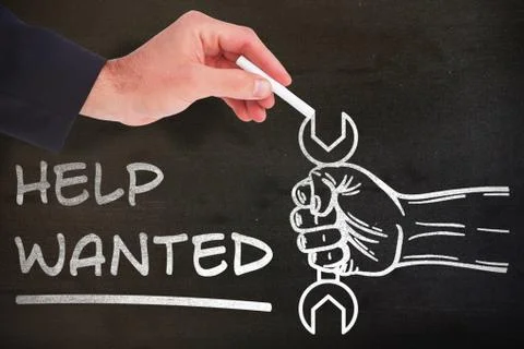 Composite image of hand holding a chalk and writing something Foto stock