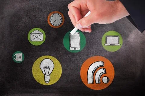 Composite image of hand holding a chalk and writing something Foto stock
