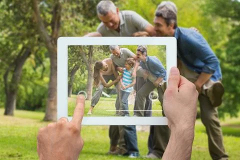 Composite image of hand holding tablet pc Stock Illustration