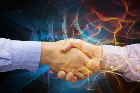 Composite image of hand shake in front of wires Stock Photos
