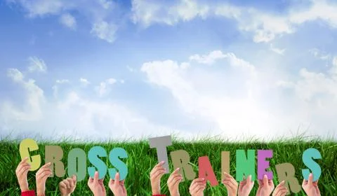 Composite image of hands holding up cross trainers Stock Illustration