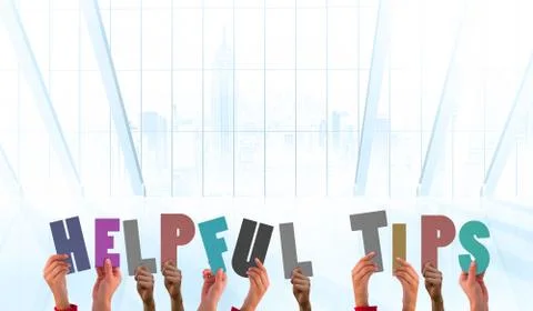 Composite image of hands holding up helpful tips Illustrazione stock