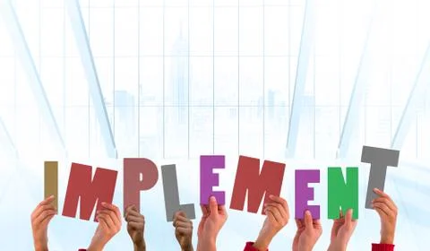 Composite image of hands holding up implement イラスト素材