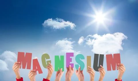 Composite image of hands holding up magnesium Ilustração Stock