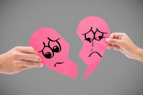 Composite image of hands holding two halves of broken heart Stock Photos