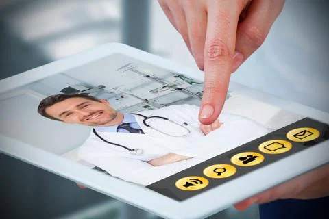 Composite image of hands using digital tablet against white background Stock Photos