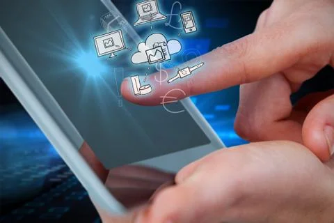 Composite image of hands using tablet on white background Stock Photos