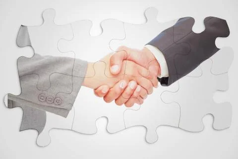 Composite image of handshake between two business people 스톡 일러스트
