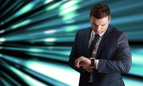 Composite image of handsome businessman checking the time Stock Photos