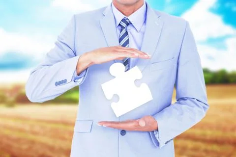 Composite image of handsome businessman gesturing with hands Illustrazione stock