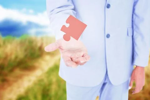 Composite image of handsome businessman gesturing with hands Illustrazione stock