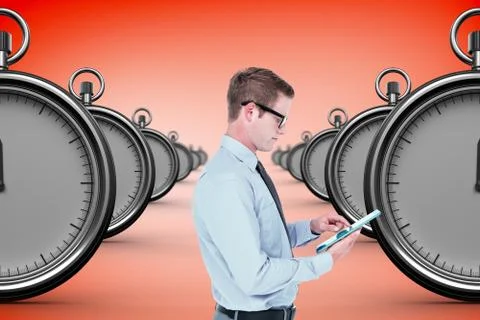 Composite image of handsome businessman using tablet Illustrazione stock