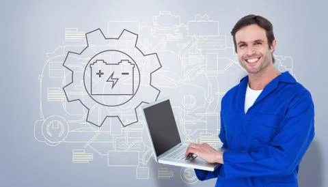 Composite image of handsome mechanic using laptop over white background イラスト素材