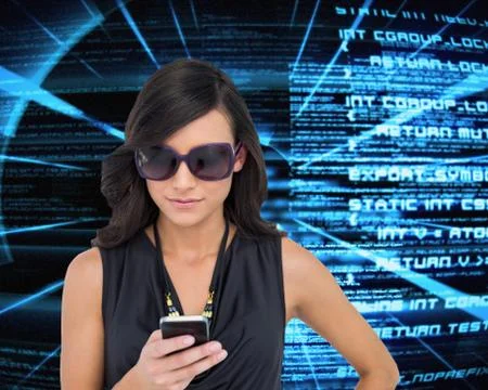 Composite image of happy brunette using smartphone Illustrazione stock