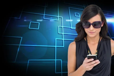 Composite image of happy brunette using smartphone Illustrazione stock
