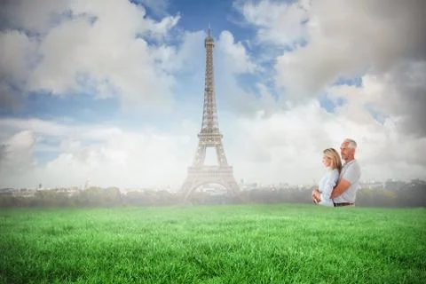 Composite image of happy couple smiling and embracing Ilustração Stock