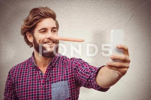Composite Image Of Happy Hipster Taking Selfie