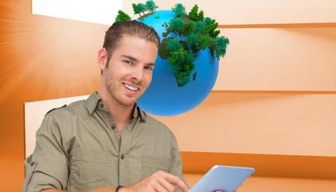 Composite image of happy man using tablet pc Illustrazione stock