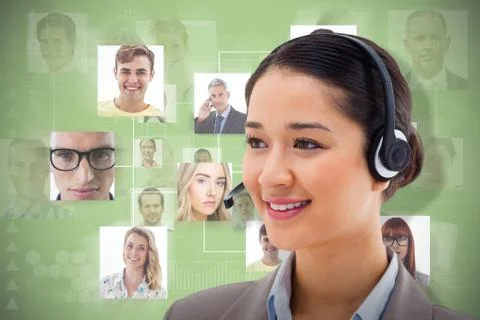 Composite image of happy operator posing with a headset 写真素材