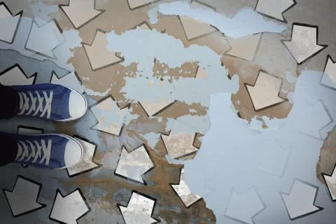 Composite image of high angle view of person wearing canvas shoes 库存照片