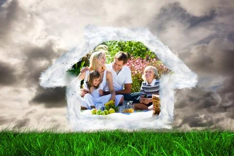 Composite image of house outline in clouds Foto stock