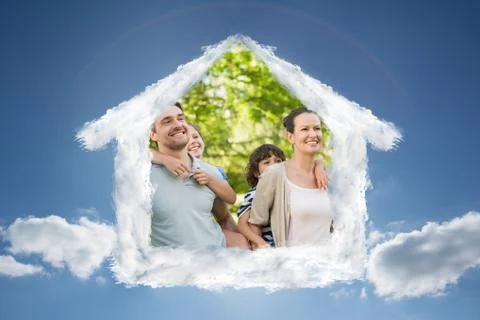 Composite image of house outline in clouds Foto stock