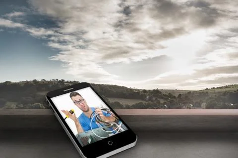 Composite image of it technician on smartphone screen Stock Illustration