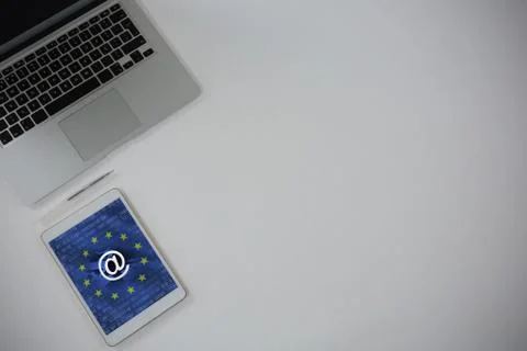 Composite image of laptop, digital tablet and pen on white background Stock Photos