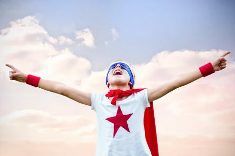 Composite image of little boy dressed as superman Stock Photos