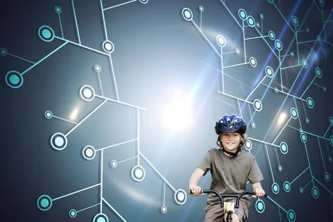 Composite image of little boy with his bike in a park Illustrazione stock