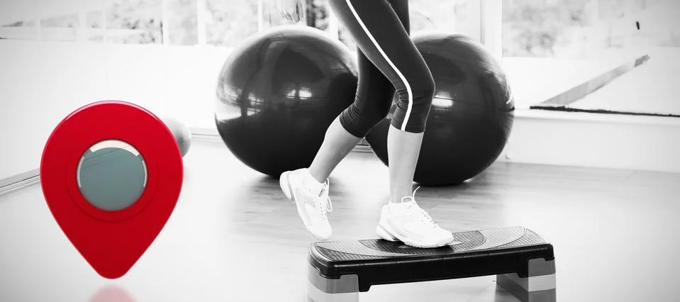 Composite image of low section of a fit woman performing step aerobics exercise Stock Photos