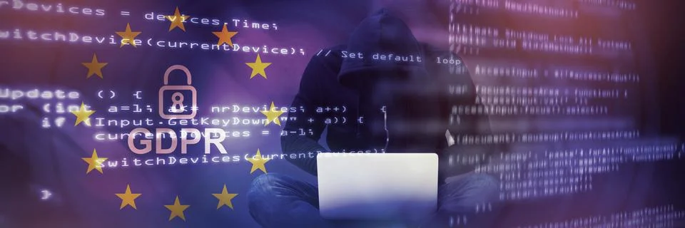 Composite image of male hacker using laptop 스톡 사진