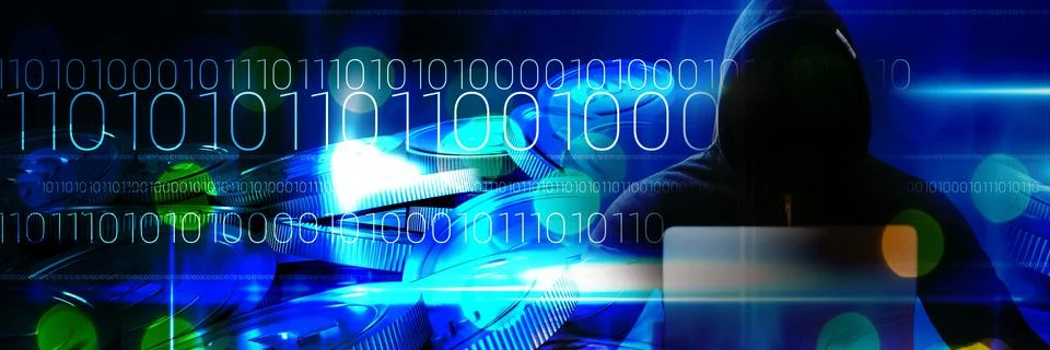 Composite image of male hacker using laptop on table Foto stock