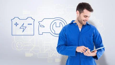 Composite image of male mechanic using digital tablet Stock Illustration