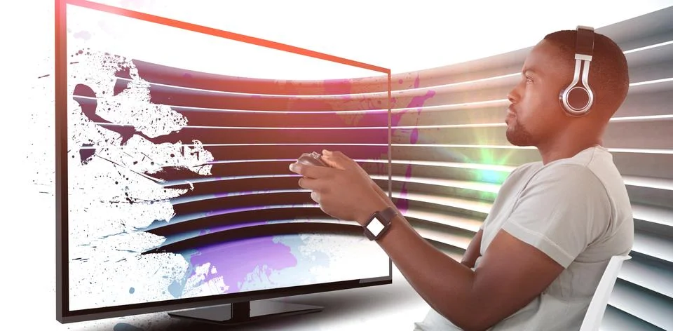 Composite image of man playing video game against white background 스톡 사진