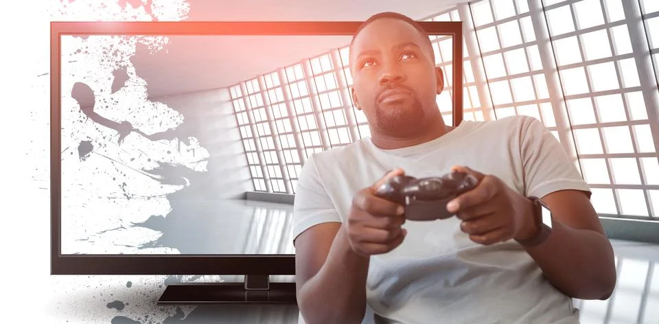 Composite image of man playing video game against white background Stock Photos