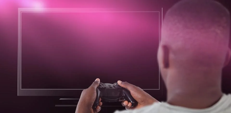 Composite image of man playing video game against white background 스톡 사진