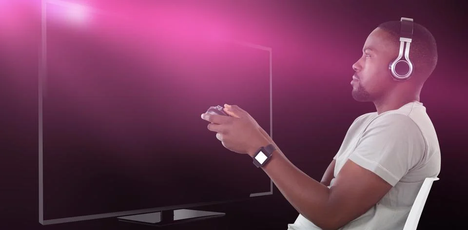 Composite image of man playing video game against white background 스톡 사진